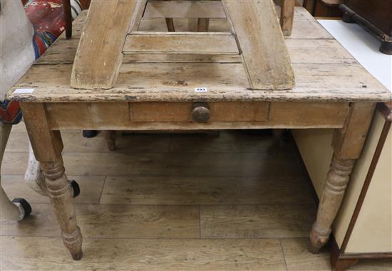 A pine kitchen table, W.104cm